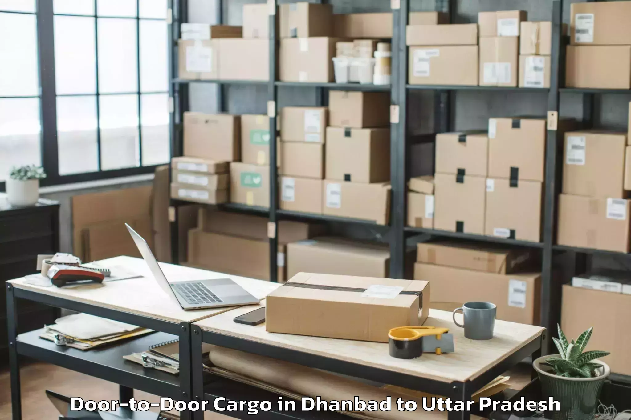 Book Dhanbad to Monad University Hapur Door To Door Cargo